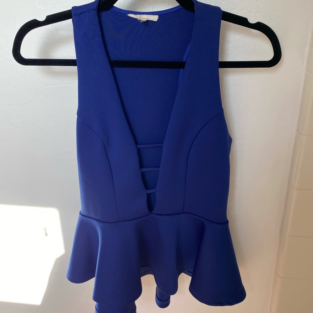 Deep Plunge Peplum Tank